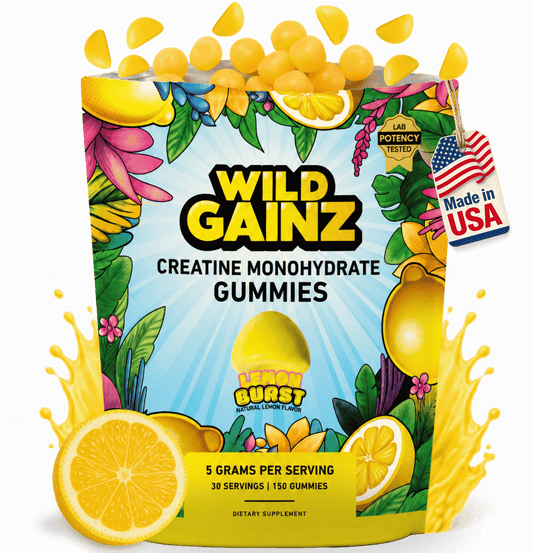 Wild Gainz Creatine Monohydrate Gummies packaging, featuring a bright yellow and blue bag decorated with lemons, tropical flowers, and green leaves, with yellow gummies bursting from the top and a 'Made in USA' flag badge.